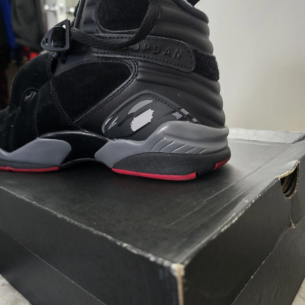 Jordan Black and Gray Sneakers with Cross-Straps...